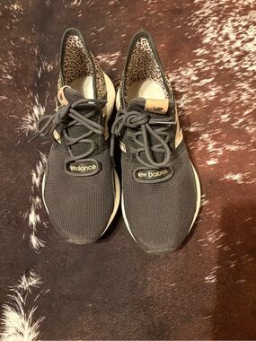 New Balance Black Sneakers with Leopard-Print Lining and Tan Accents